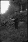 Man med cykel
