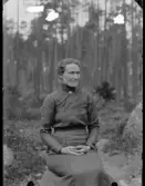Kvinna