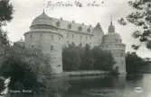 Vykort med motiv av Örebro Slott. Skriven text på baksidan, adresserat Sonja Sundberg.