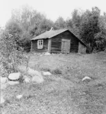 Stora Skedvi. Löves Smedja i lövskog, Nyberget. 1927.