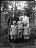 Familj med tre barn