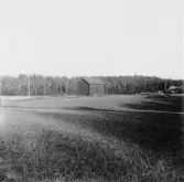 Grytnäs. Liljansberg. Härbre med dörr på långsidan. 1930.