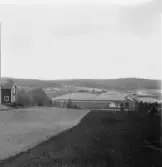 Grytnäs. Stusshyttan. Från Höganäs, Abrahamsbo i bakgrunden. 1930.
