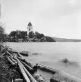Rättvik. Kyrkstallar och kyrkan.