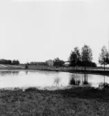 By, Rosse. Tunnvälvd stenbro över Ånans utlopp och Janols, 1931.