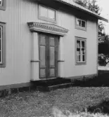 By, Spisbo. Portal på Alfred Gustafssons ena flygel. 1931.
