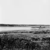 By, Spisbo. Vik av Rudusjön från Israels i Rudu, Spisbo bortom viken. 1931.
