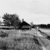 By, Fullsta.Smedja med sadeltak på skorsten. 1931.