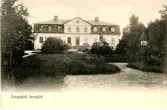Oskrivet brevkort med motiv av Kungsgårdens herrgård och dess trädgård.