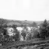 Gagnef. Från brinken mellan Bodarna och Arvslindan. 1920.